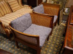 Illum Wikkelso for Silkeborg, a pair of Danish teak and canework "Plexus" armchairs, bearing maker's