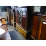 19th century mahogany side cabinet, the upper section with glazed doors flanked by panelled doors,