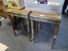 A pair of Regency style cane inset faux bamboo occasional tables