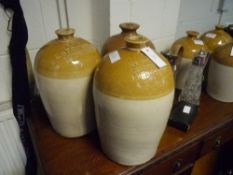 A group of three large stoneware salt glazed flagons comprising: D & J Robertson Edinburgh, Port