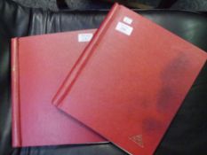 Two Stamford albums of World stamps (a large quantity)