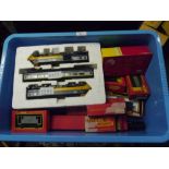 A group of Hornby and Tri-ang boxed 00 gauge diesel locomotives and rolling stock