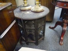 An Anglo-Indian carved hardwood folding occasional table, early 20th century