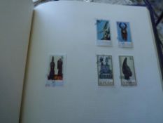 An album of World stamps including Vietnam and Burundi