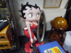 A life size Betty Boop composition figure with mirror 122cm