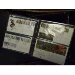 Two albums of approximately 150 GB Post Office and Royal Mail First Day Covers 1980-97 including