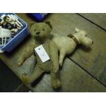 An early 20th century straw-stuffed teddy bearl, probably German, with growler (a/f) together with a