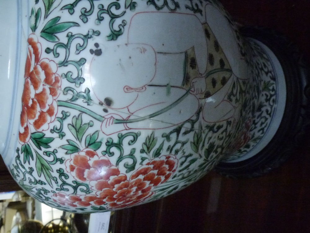A Chinese porcelain baluster jar and cover in the famille rose palette decorated with figures - Image 2 of 7