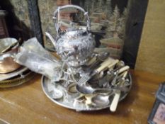 A Victorian silver plated hot water kettle on stand together with a group of silver plated