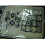 Twelve sheets of shell, glass and plastic vintage buttons