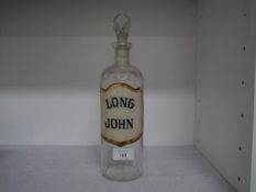 A Long John Scotch Whisky glass decanter, c. 1900., the brand reverse painted in a gilt-outlined