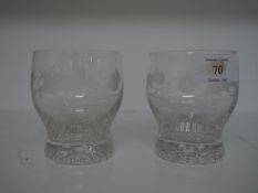 A pair of water glasses acid etched with a band of thistles