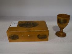 A 19th century Mauchline ware jewellery or sewing box with lined interior, printed with scenes