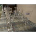 A set of eight Edinburgh Crystal goblets, each bucket bowl with graduated oval-cut bands on a flat-
