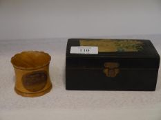 A 19th century Mauchline Ware napkin ring printed with a view "Dumfries from Observatory";