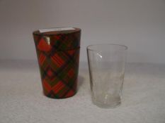 A 19th century Tartanware cased whisky tot glass, the glass acid etched with ferns