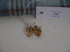 A pair of early 20th century citrine and yellow metal drop earrings of "Luckenbooth" form, with