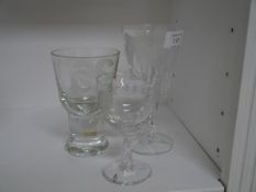 Three Scottish engraved drinking glasses, two Caithness, the engraved decoration including