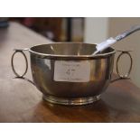 A George V silver twin-handled porringer, Sheffield 1911, engraved with presentation inscription;