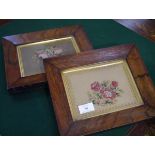 A pair of rosewood framed floral needlework panels. Overall 22cm by 27cm