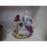 A late 19th century Meissen porcelain figure, a lady seated with bible in her right hand beside a