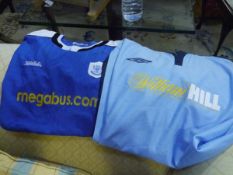 A St. Johnstone F.C. home shirt, signed, with another (2)