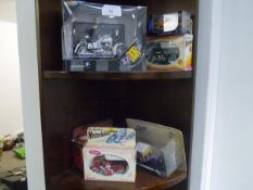 A group of boxed model vehicles including two Zylmex motorbikes, Matchbox Models of Yesteryear