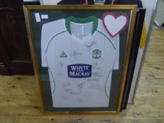 A framed Hibernian FC football shirt, signed, various players