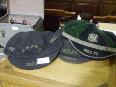 Three early 1920's sporting caps, all bearing Aitken & Niven, Edinburgh labels, one in striped green