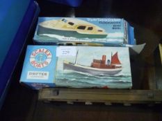 A Scalextric model boat, boxed, Clyde Cabin Cruiser, and a wooden train model