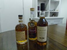 Three bottles of Scotch malt whisky: Monkey Shoulder, Batch 27 blended malt; The Tormore