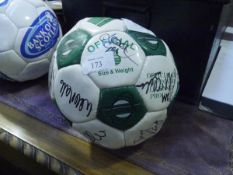 A signed Hibernian FC ball, signed by various players including John Hughes