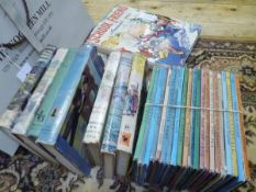 A group of vintage childrens' books, including Ladybird, Enid Blyton and Biggles