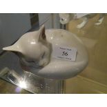 A Royal Copenhagen porcelain model of a sleeping cat, no. 3001/422