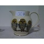 A large Emma Bridgewater jug painted with owls perched on a branch, marked for the Bridgewater