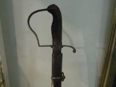 A cavalry trooper's sword, probably German, 19th century, with curved shallow fullered blade and