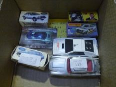 A group of vintage toy cars including three Corgi boxed and a Matchbox, boxed etc