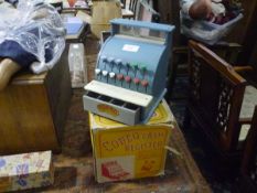 A 1950's toy cash register, the "Codeg", boxed