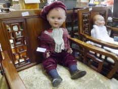 A 1930's celluloid Scottish Laddie doll, in original clothing