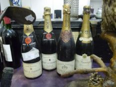 A group of four champagnes inc, Krug 1952, Moet Chandon etc