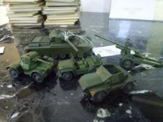 A group of Dinky model military vehicles comprising: a Centurion tank, no. 651; an Armoured Car