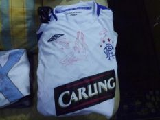 A Rangers F.C. away shirt, signed