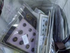 A bag containing a large group of vintage and antique buttons