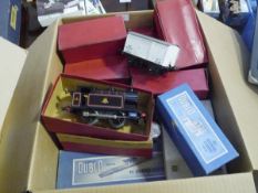 A box of Hornby Dublo rolling stock and track, much boxed including tank locomotive, low sided wagon