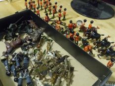 A quantity of Britains painted toy soldiers including Guardsmens' band, Grenadier Guardsmen,