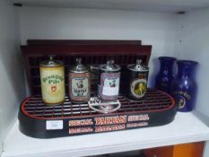 A group of breweriana including branded lighters, drip trays etc