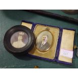 A portrait miniature of a mustachioed gentleman, oval, on ivory, in a yellow metal frame, in a