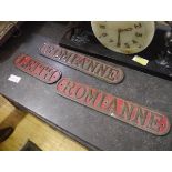 Three late 19th/early 20th century cast iron name plates, probably boat's plates, two for "