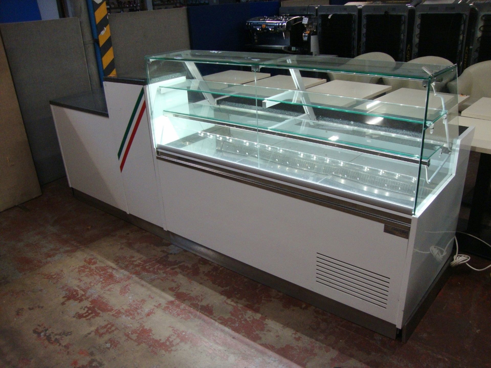 2014 large refrigerated counter.  The largest section consists of a glass fronted internally shelved