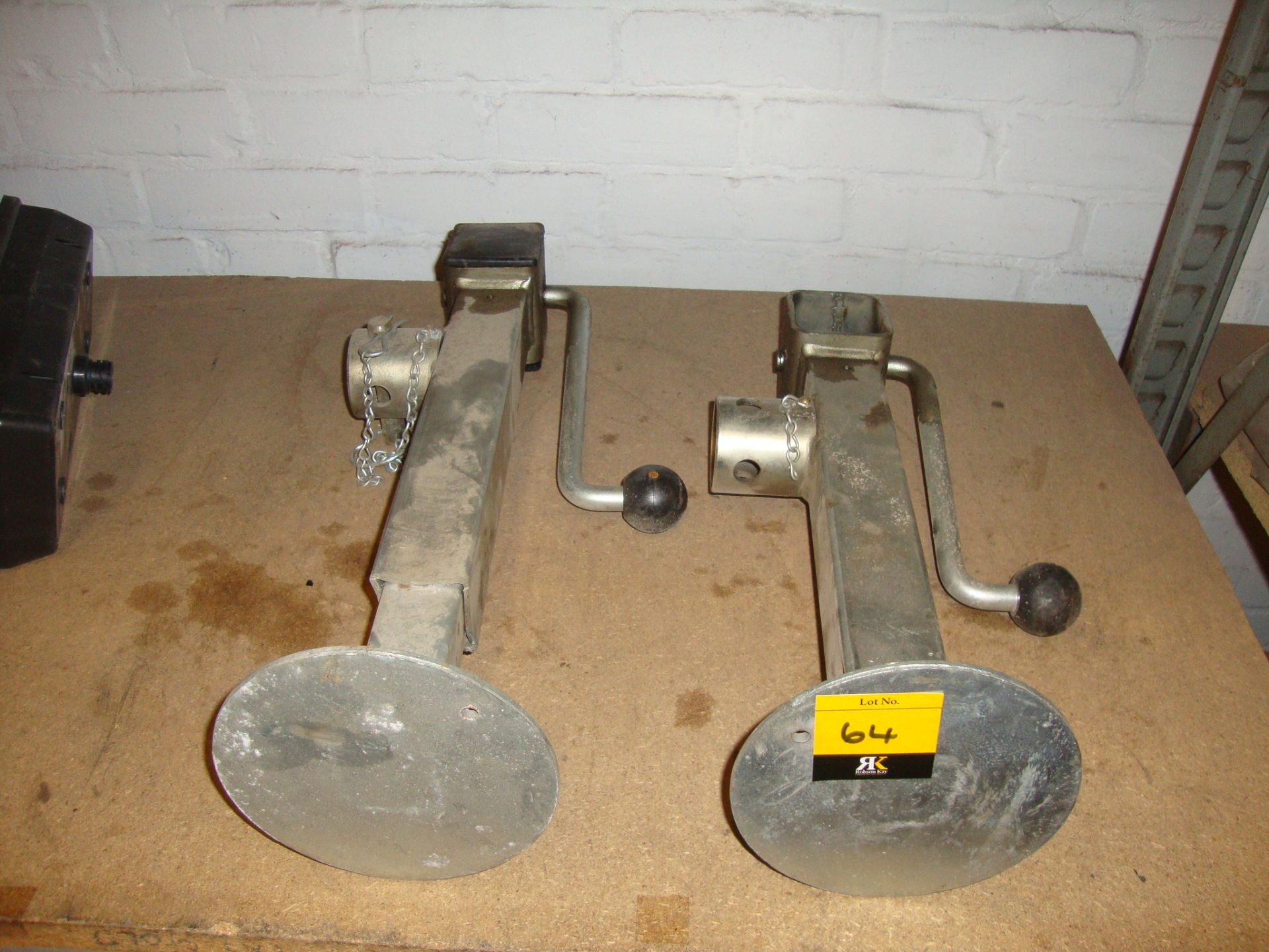 Pair of wind-up trailer legs. This lot is exempt from VAT, however it is still subject to a Buyer'